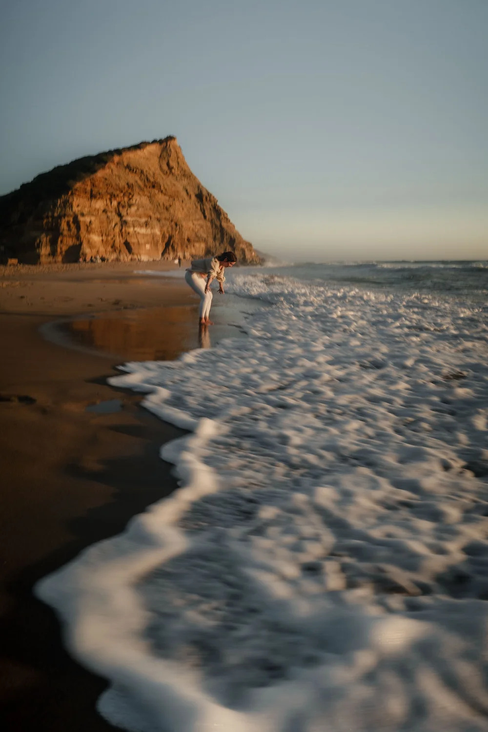Wellenlinie am Strand, Praia do São Julião, Portugal