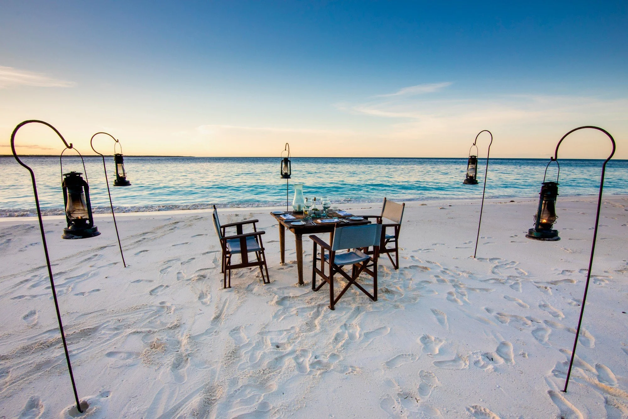 Zanzibar-Mnemba-Island-dining-private-beach-dinner-setup_w2000.jpg