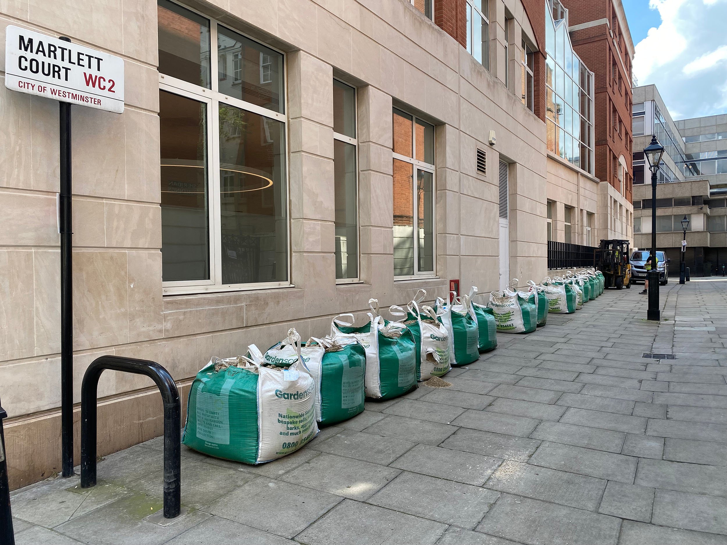 After the large lorries would deliver the bags to Drury Lane, the forklift would move them to Martlett Court to keep the Drury Lane pavements clear