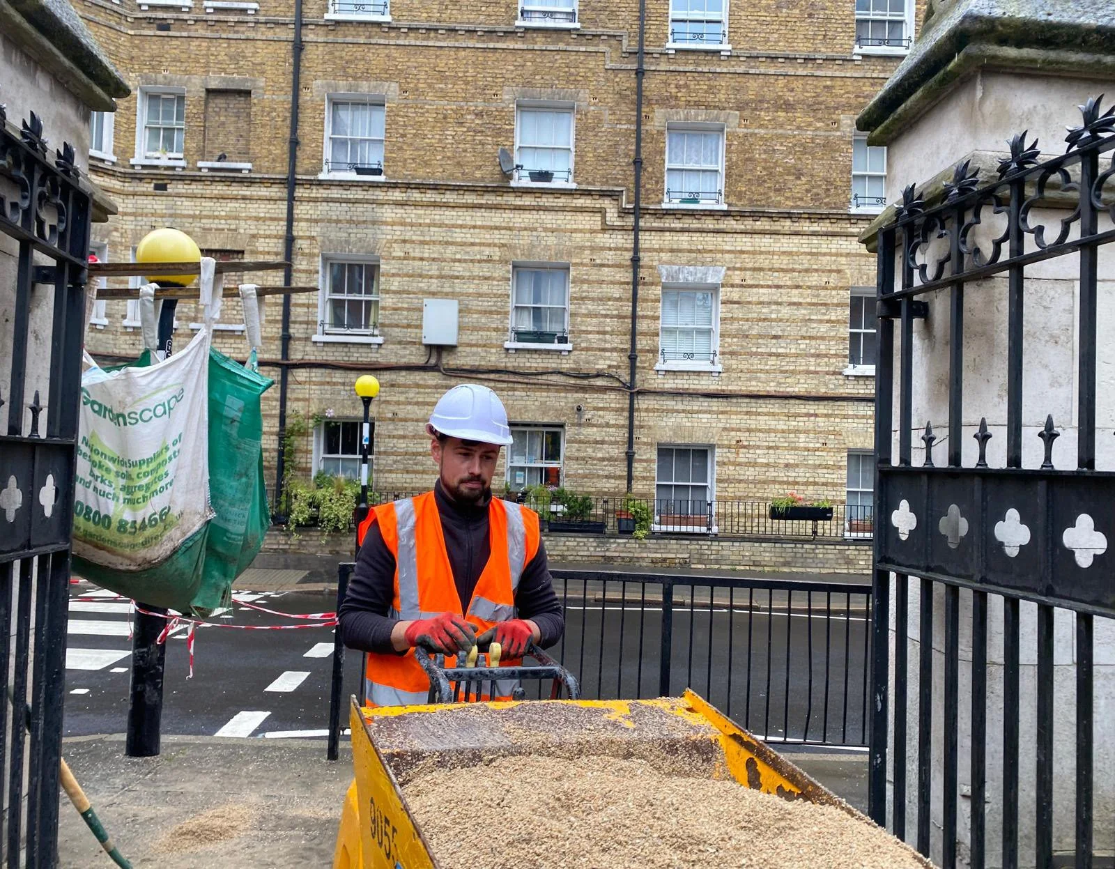 A powered barrow being used to get the sand up the Playground’s narrow ramps