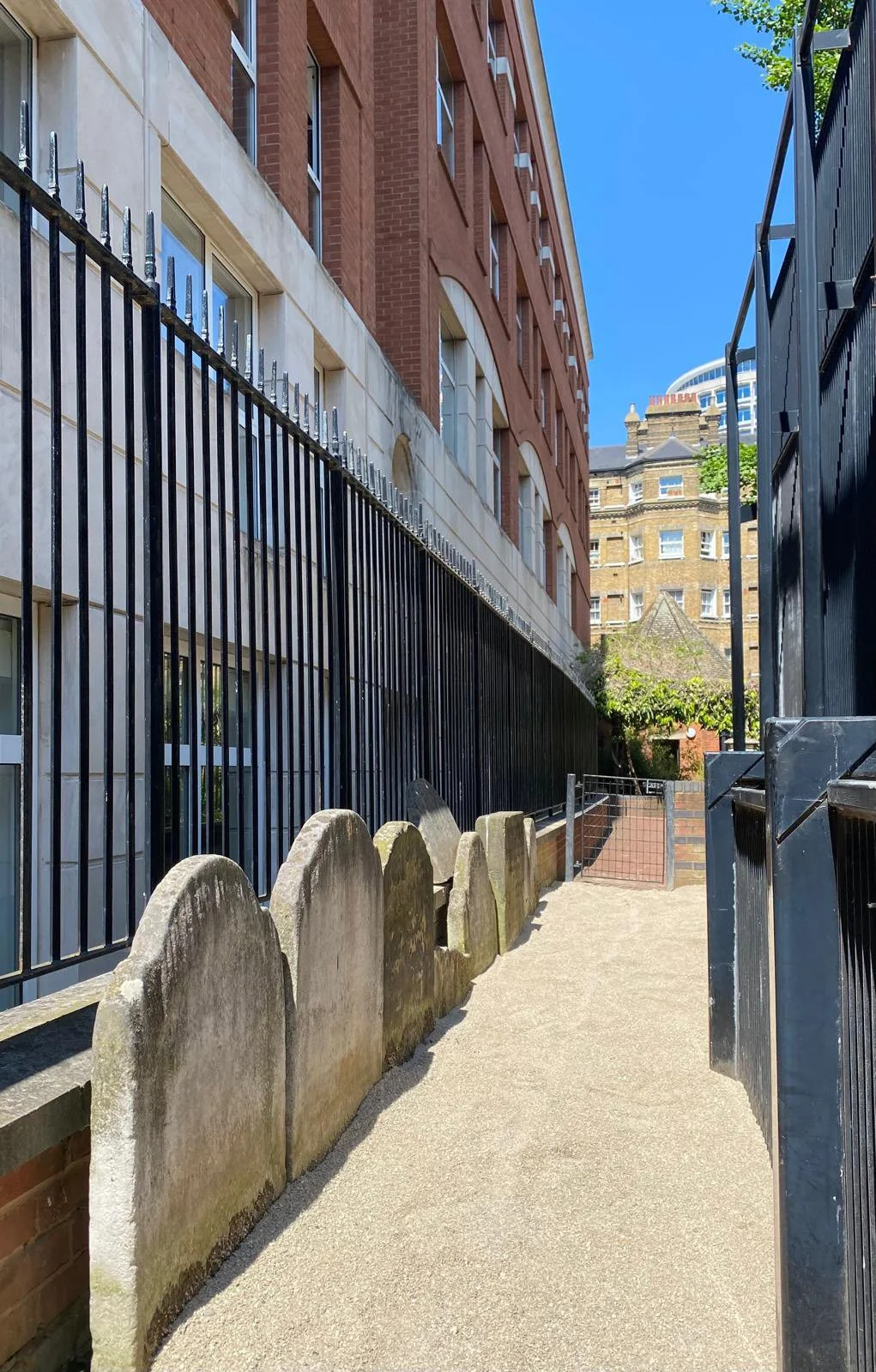 The appearance of the remaining 19th century gravestones enhanced by the new sand
