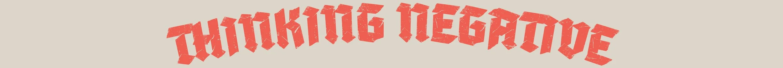 Text that reads "Thinking Negative" in bold, stylized red font on a light background.