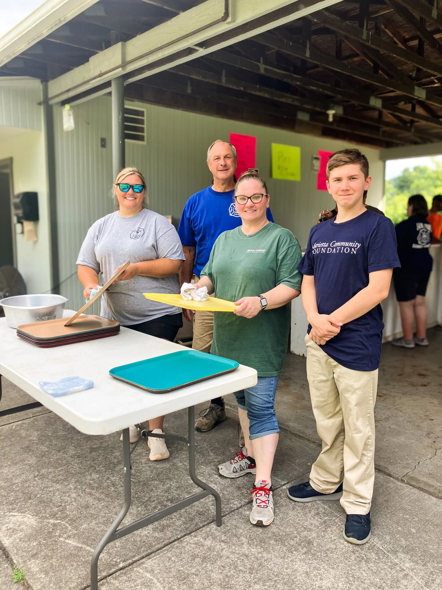 Britani and Seth recently rolled up their sleeves to support the Lowell Adams Volunteer Fire Dept & Auxiliary during their annual Ice Cream Social at Buell Island!