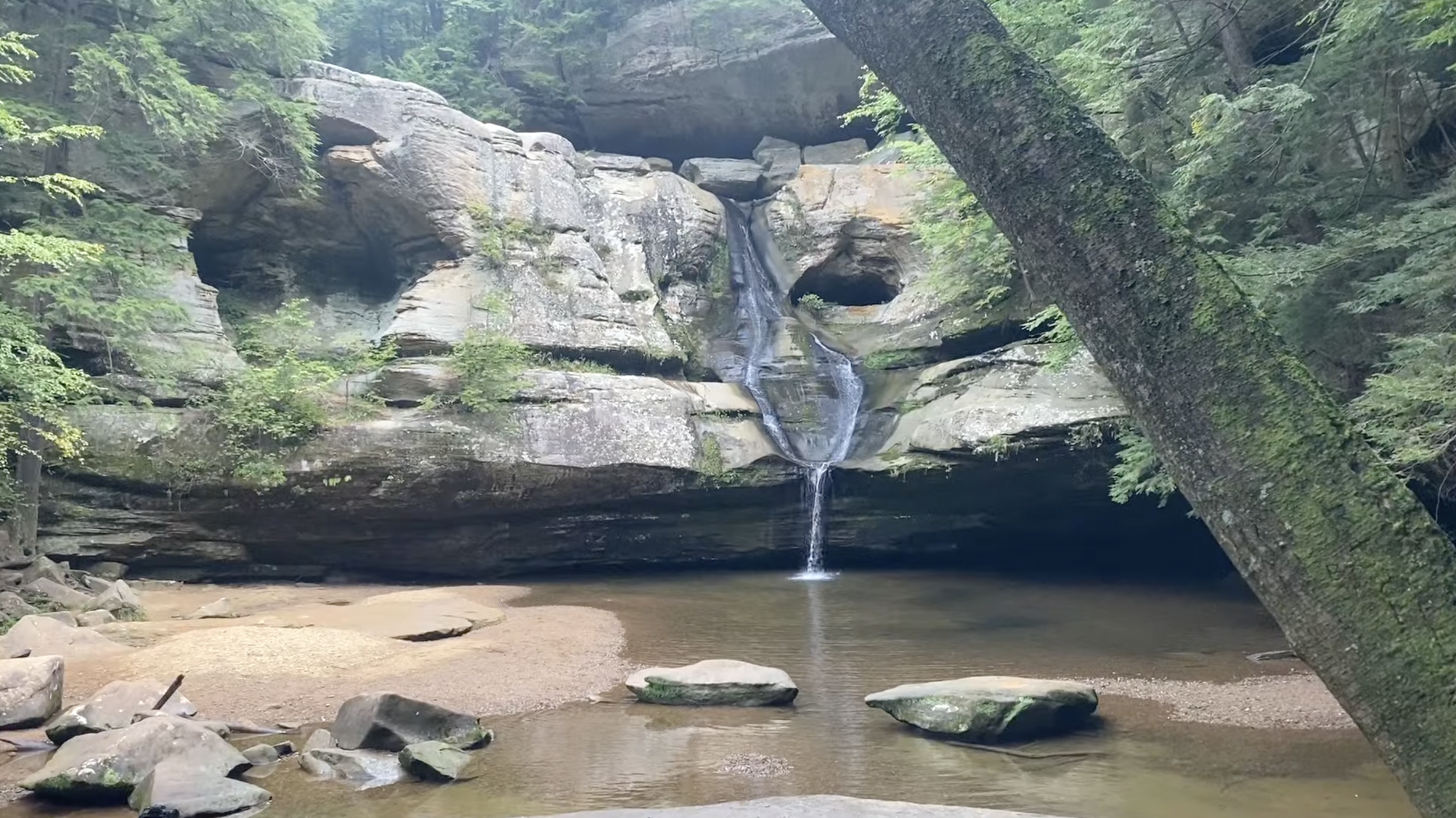 Cedar falls flowing into a body of water