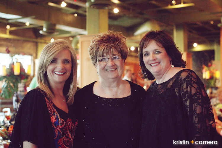  The shot is Kathy, the mother of the groom, and her family. She created the slideshow for the night and I have to give her a shout out. HELLO! I know how hard and time consuming these things are and she did it with such class and style! No cheesy tr