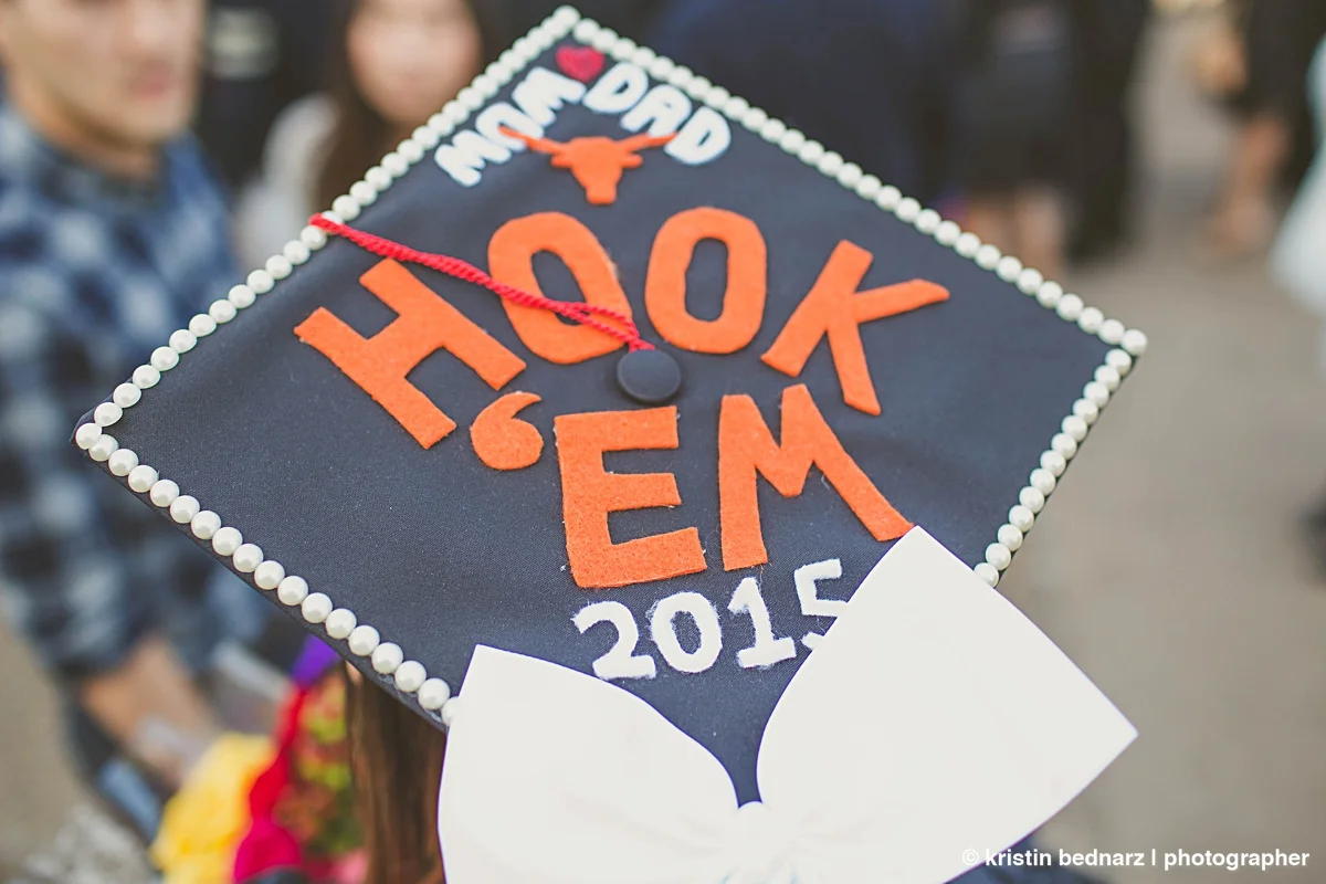  Several graduates decorated their caps.    