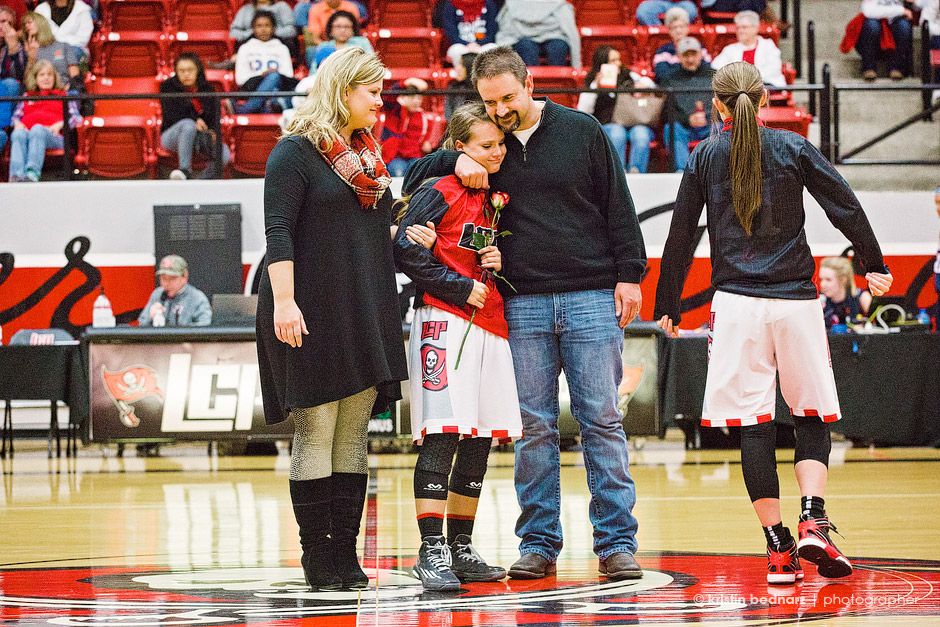 Sweet Addi Fuller with her mom and Dad.