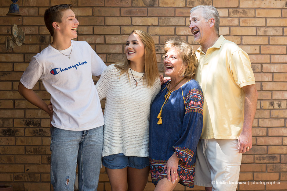  The photograph above is a cute moment between the family . One of those where I said, "Pick your favorite family member and laugh at them". &nbsp;It cracked me up that each and everyone looked at the youngest. &nbsp;He must be quite a charachter! &n