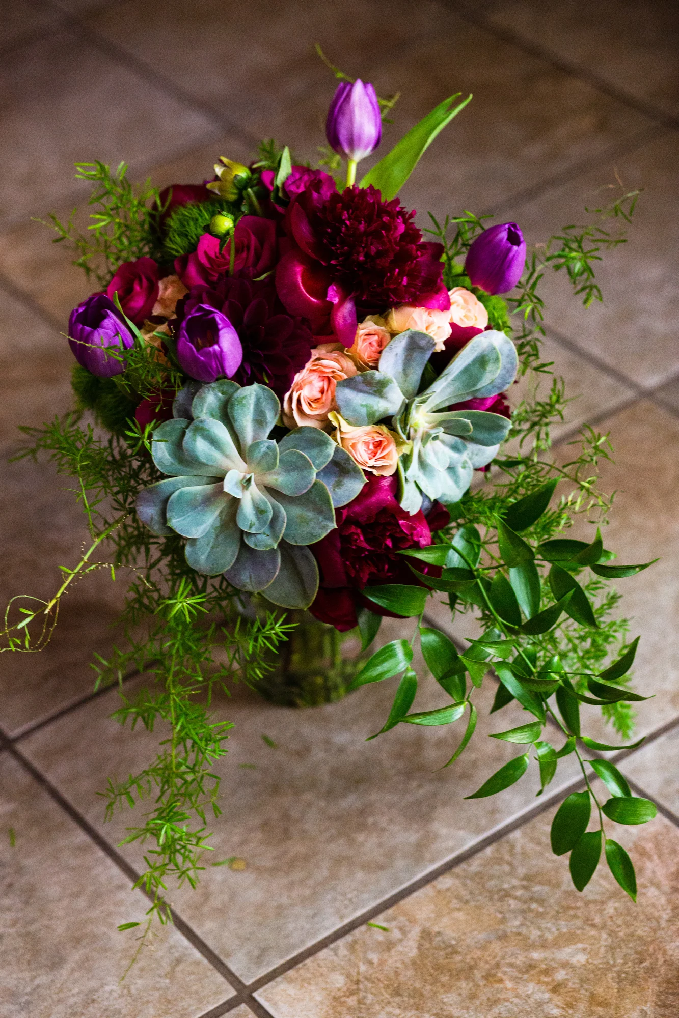  The bride’s bouquet featured succulents and flowers.  Renee had a cactus theme, beautiful types, in the details of the day. 