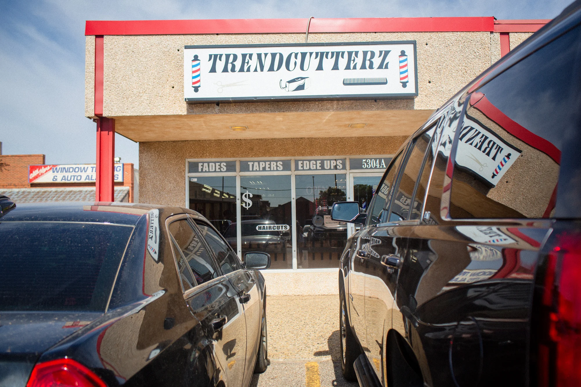  BJ had plans that morning to get spiffy at his local barber shop, Trenscutterz.  They h ave a cool street feel, almost like a car shop or pit stop.  From the lighting to the hair blower, super cool.   