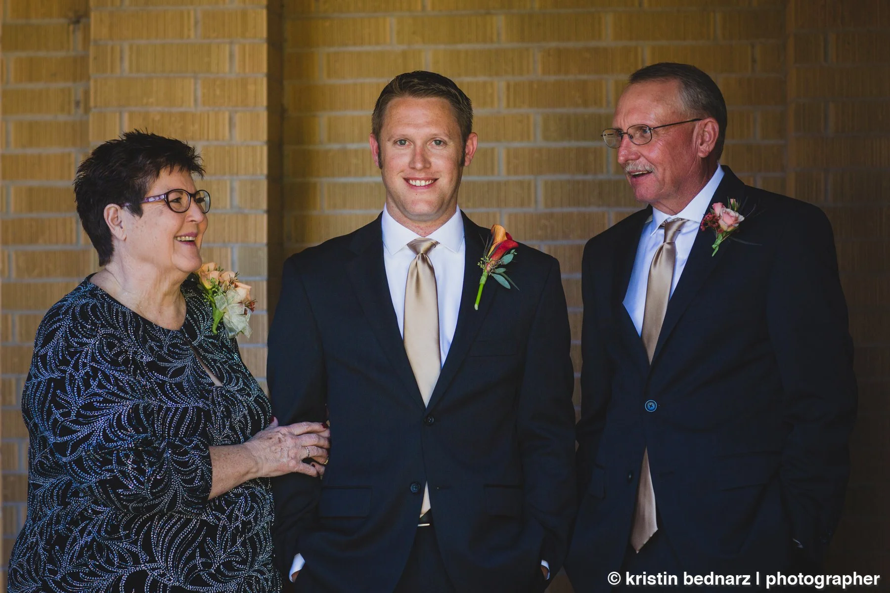  We then met his mom and dad at the church for some photos.  Quick and easy and don’t make ‘em sweat.  That’s my motto. 