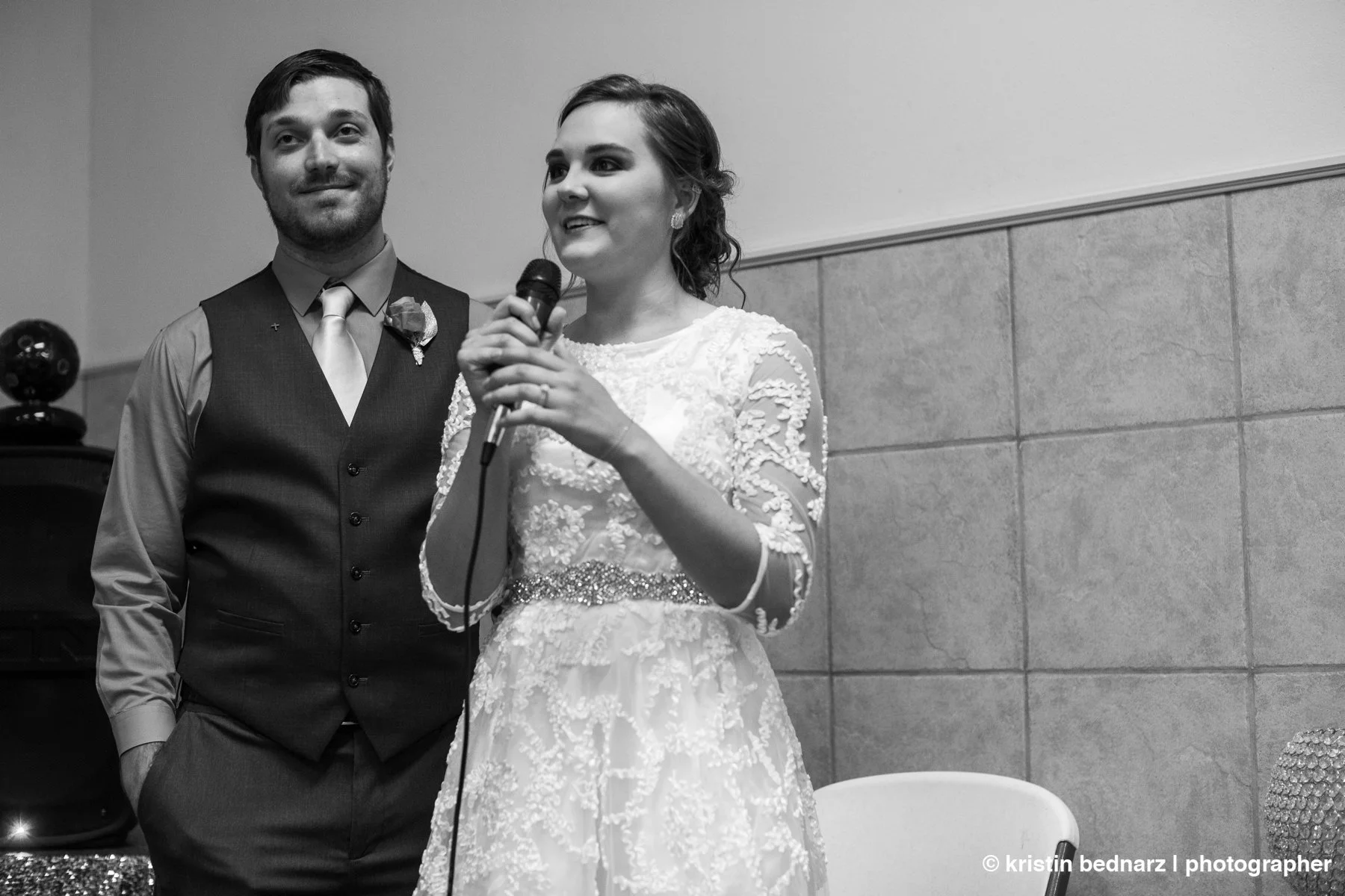  Kelcee told the story about how they met.  They knew each other through their parents.  Or knew of each other.  But to let Kaleb know she was interested took a bit longer.  It involved gum and facebook.  Super cute story and they had gum there for e