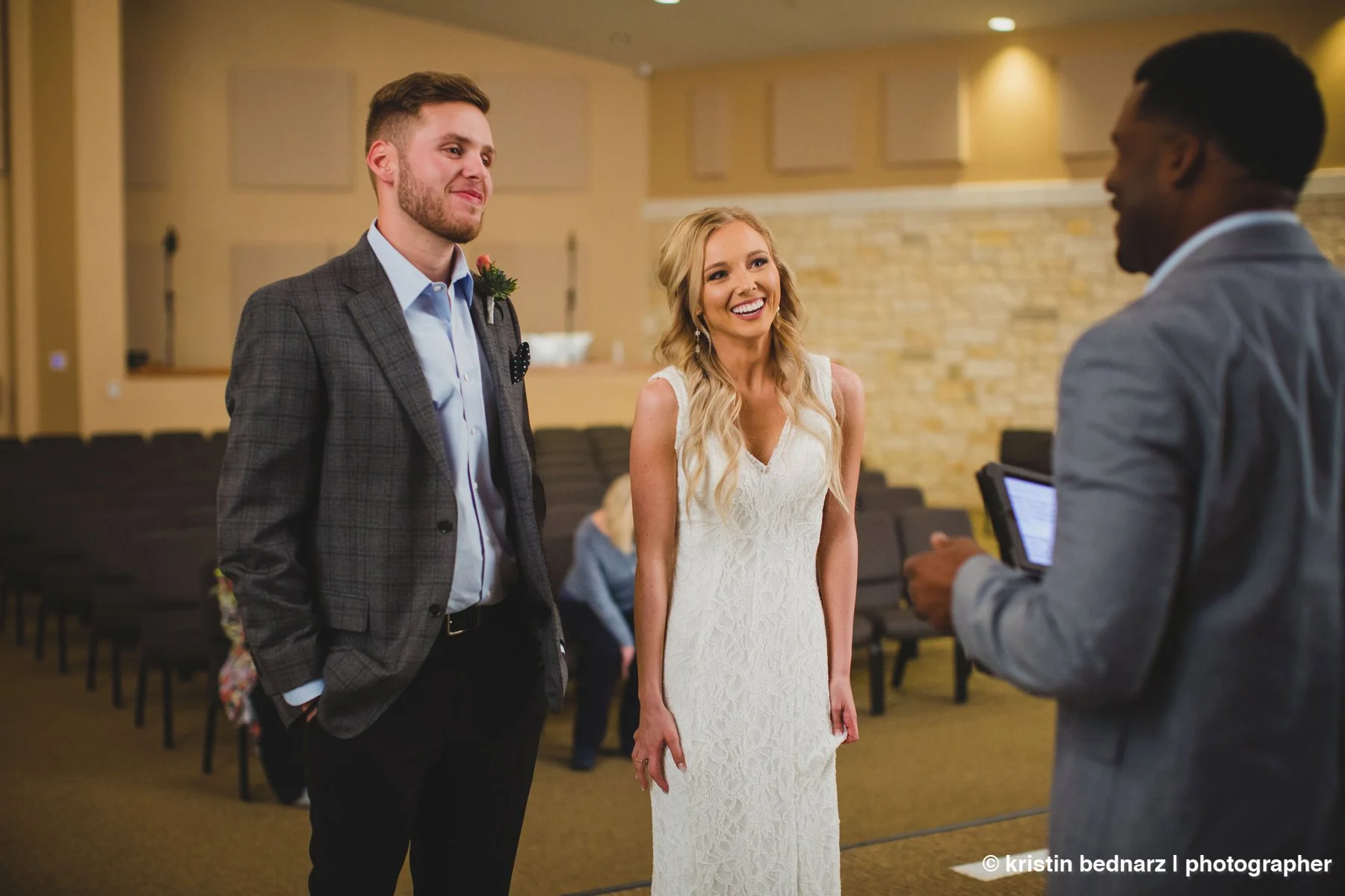  a little nerves are eased with a sweet joke by the pastor. 