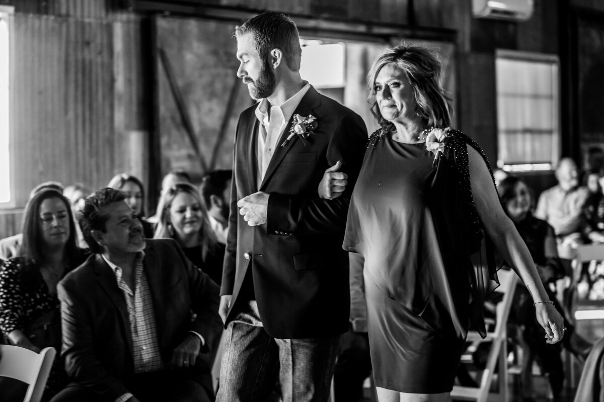  Justin’s momma had a long aisle to walk down.  I’m so happy he escorted her.  His dad passed away several years back and she needed Justin on her arm.  Everyone felt the loss of him not being here on this day.  Losing loved ones is so very hard. 