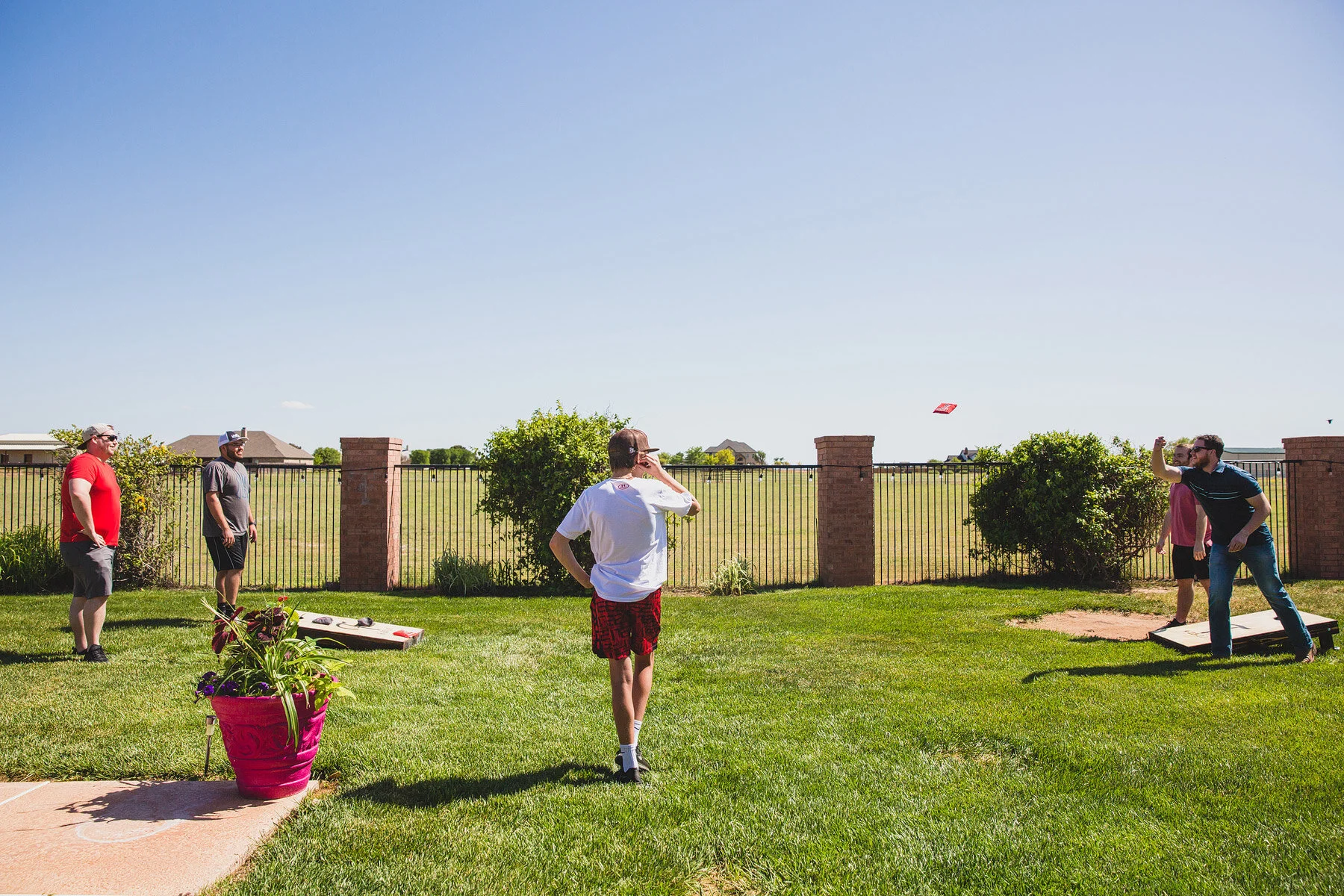  the boys started the day with a little corn hole. Fun game, corn hole. I just recently started playing. I’ve been photographing it for years and never really played.  Fun game! 