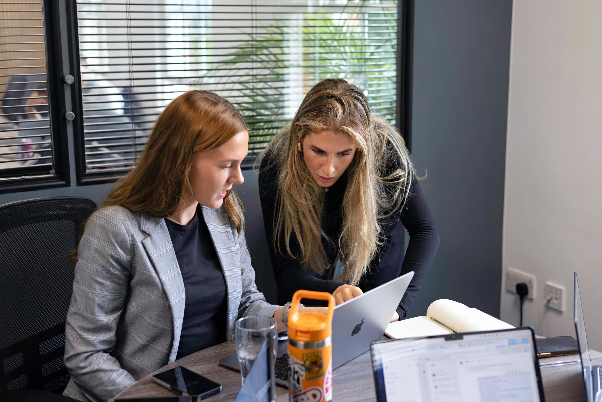 How can AI literacy help agencies overcome bias in AI outputs?