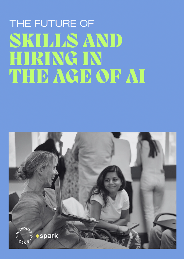 Cover page for a publication titled "The Future of Skills and Hiring in the Age of AI." Contains a black-and-white photo of a woman in a wheelchair holding a laptop, smiling and talking to a young woman. Background shows other people standing and talking.