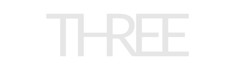 The word 'THREE' in large, bold, gray letters on a black background.