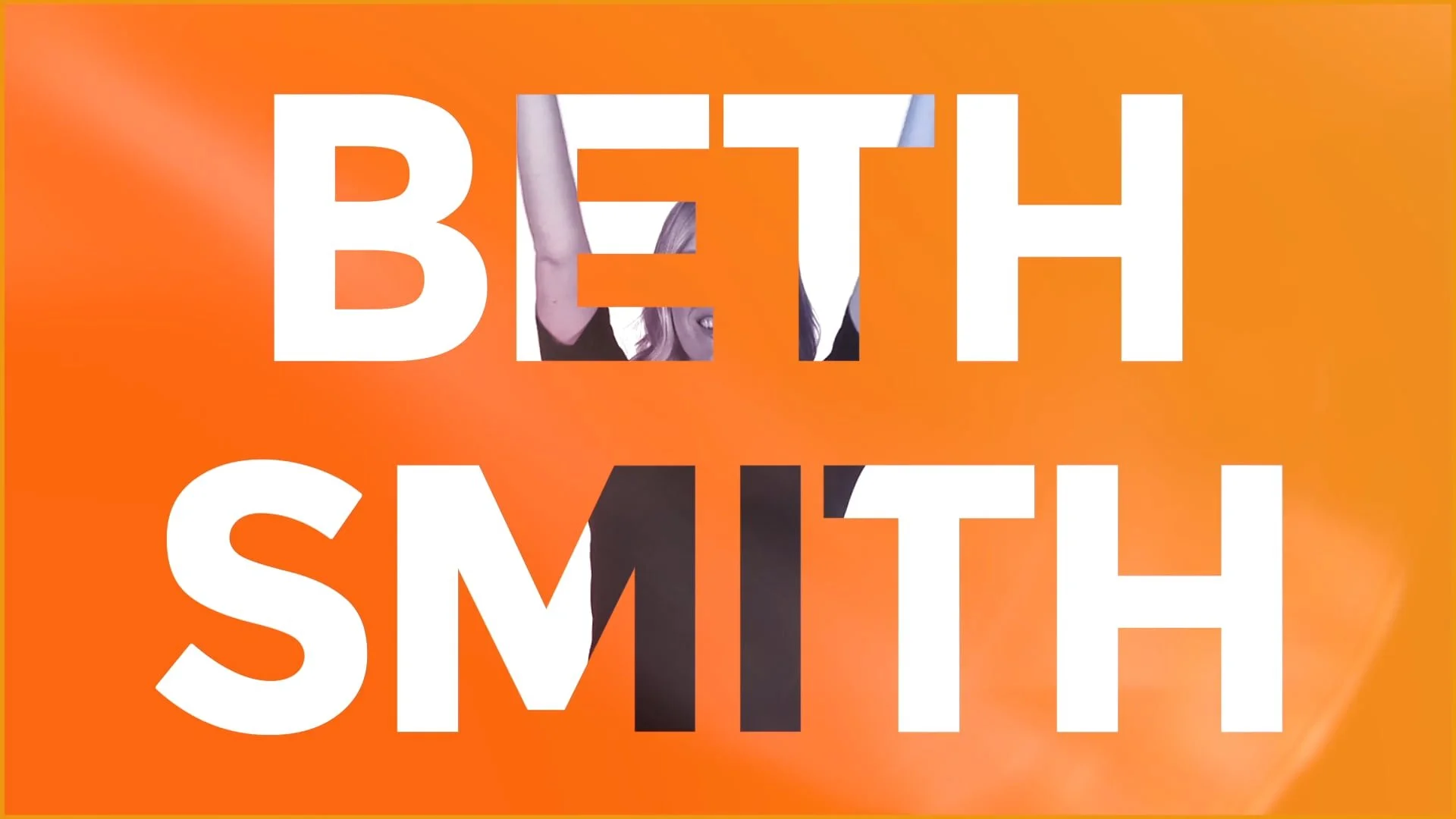 Text reading 'BETH SMITH' with a partial image of a woman raising her arms and smiling visible through the letters.