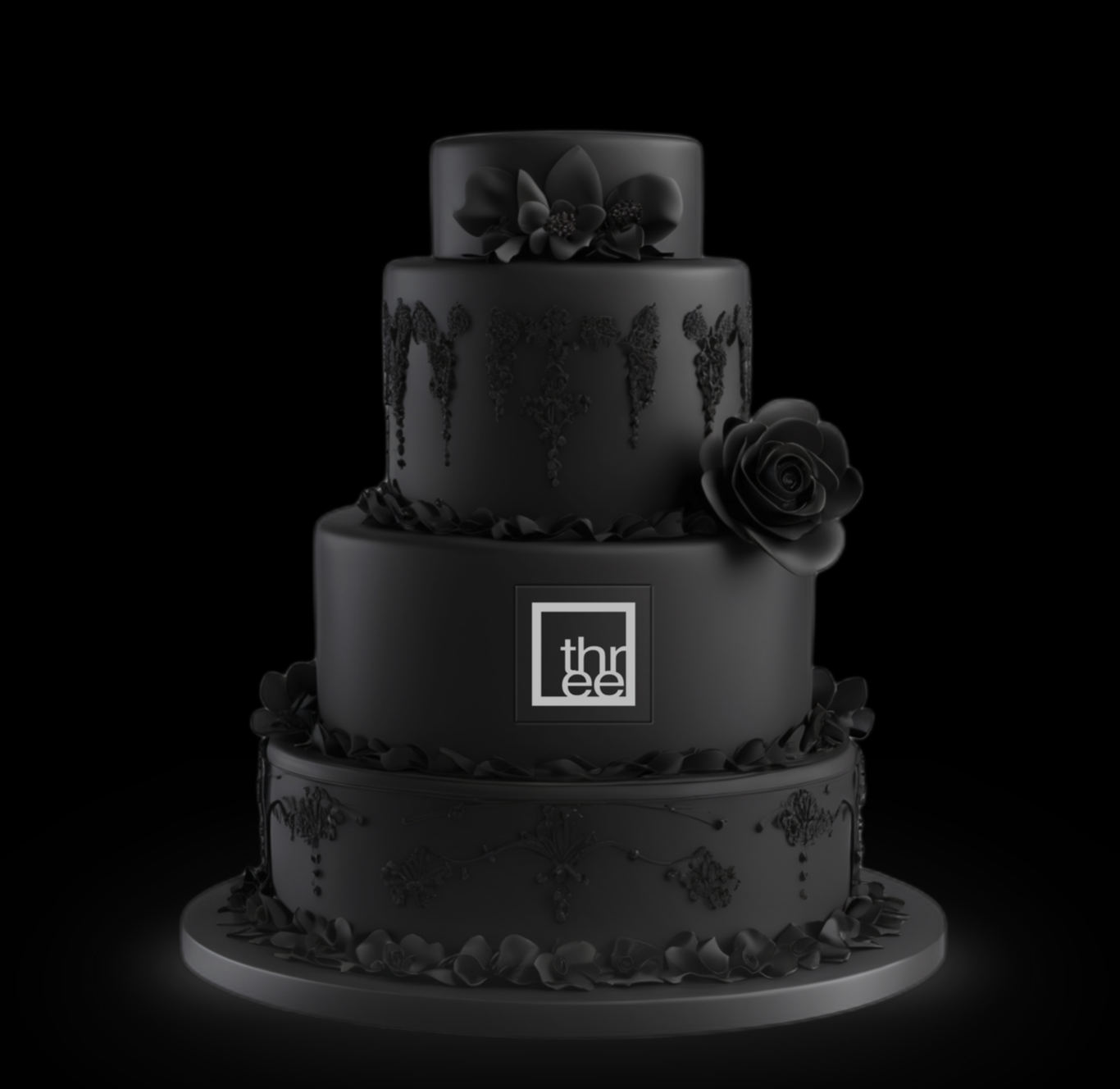 A four-tier black wedding cake decorated with black roses and intricate black icing designs, including a logo with the text 'thrее' on the second tier.