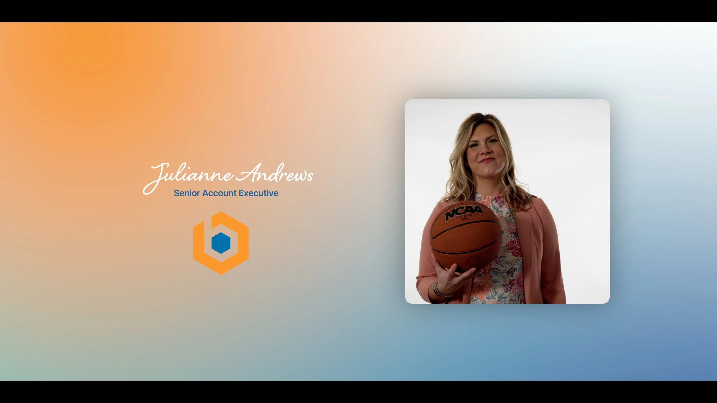 Slide with a woman holding a basketball, wearing a pink blazer and floral top, with the text 'Julianne Andrews, Senior Account Executive' and a logo.