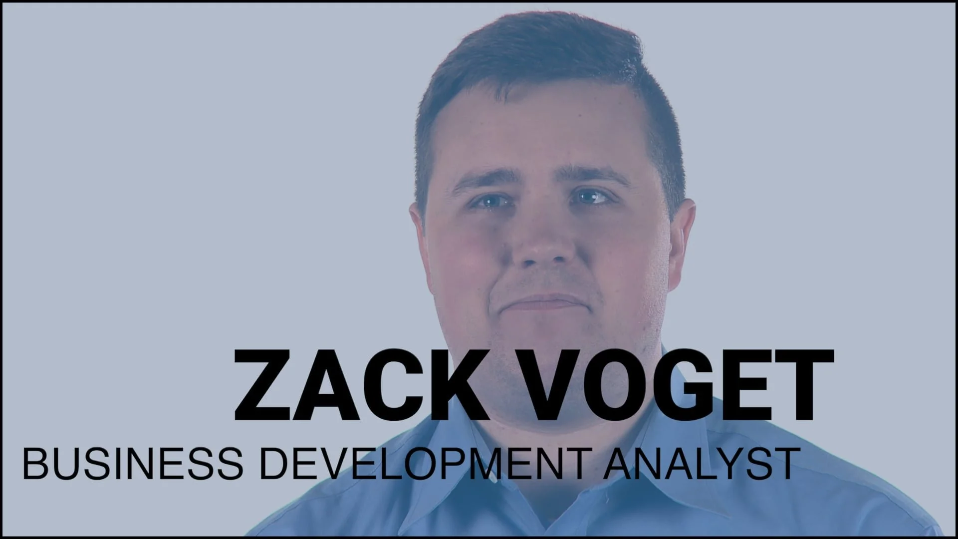 A professional headshot of Zack Voget, a business development analyst, with text overlay of his name and job title.