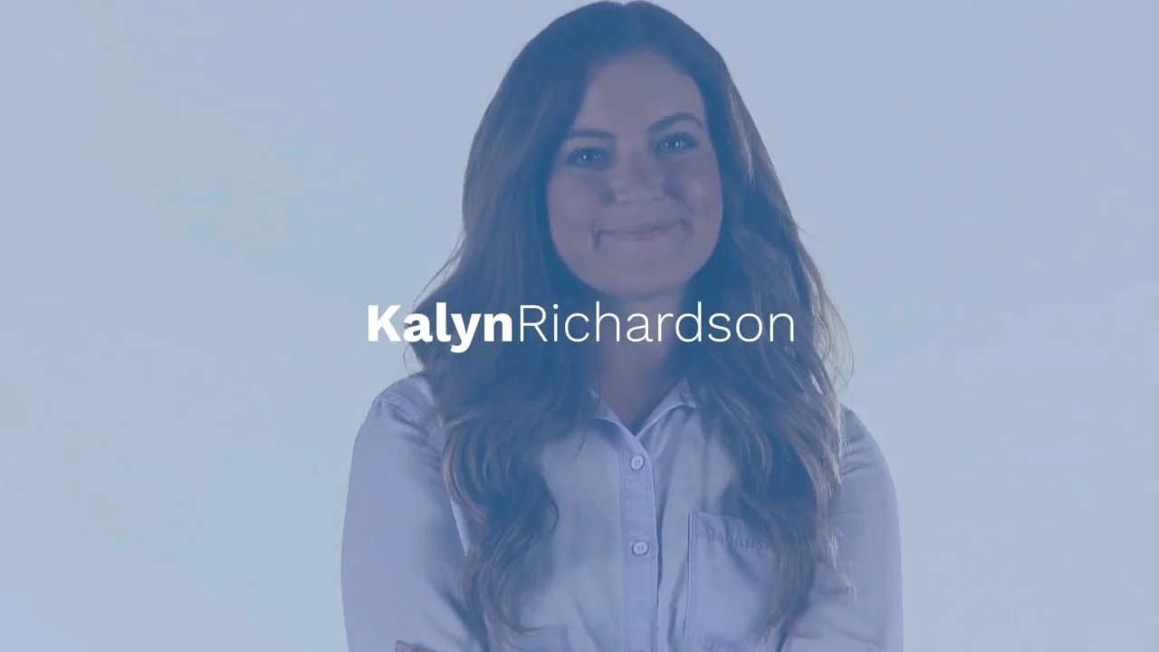 A woman with long wavy brown hair smiling at the camera, wearing a light-colored button-up shirt, with text overlay of her name 'Kalyn Richardson.'