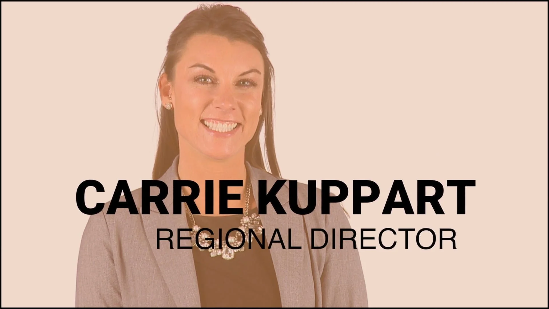 Professional portrait of Carrie Kuppart smiling, wearing business attire with a necklace and earrings, against a light background. Text overlay reads "Carrie Kuppart, Regional Director."