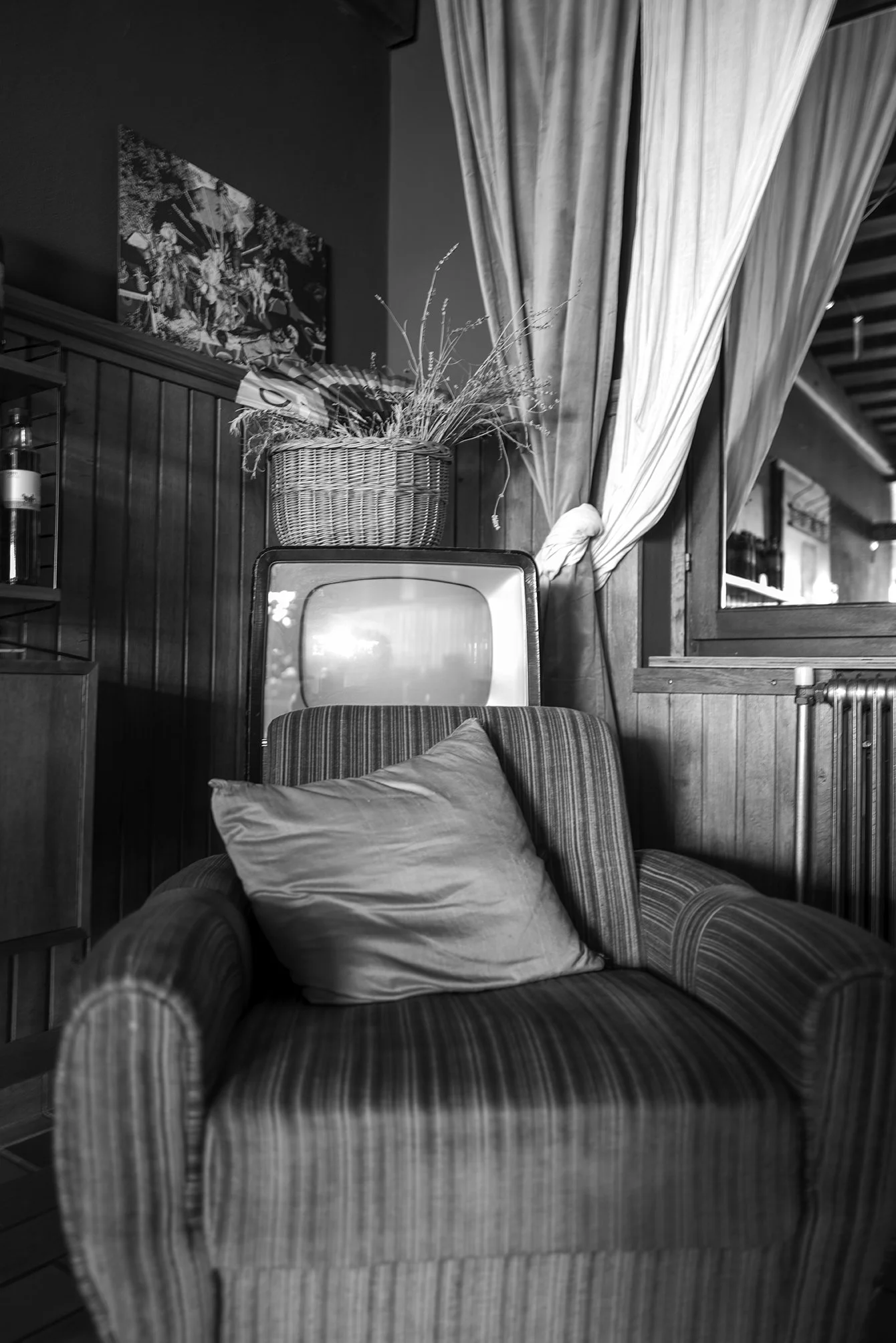 Interior design and vintage furniture at Absteige Zur Bärtigen Therese, the first queer hotel in Austria, showcasing a unique alternative and lesbian travel destination.