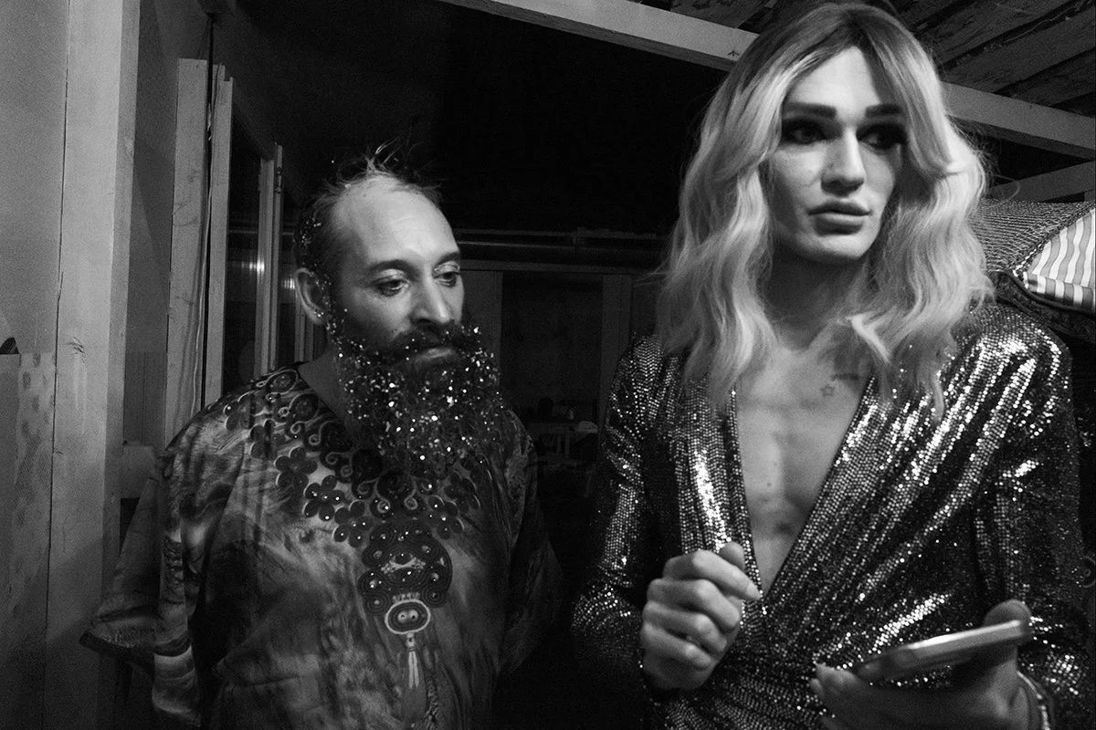 Itshe Petz and Christoph Skoff, as his drag persona Gloria Hole, setting up a late-night photoshoot for an upcoming queer event at the hotel in Austria.
