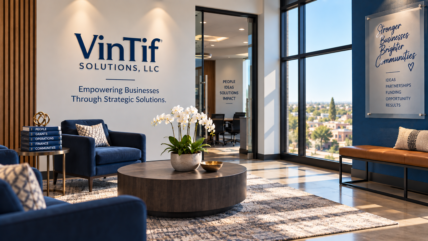 Modern office lobby with blue velvet armchairs, a round wooden coffee table with a potted orchid, and a large window showing a cityscape. Walls display the company name "Vintif SOLUTIONS, LLC" and motivational messages.