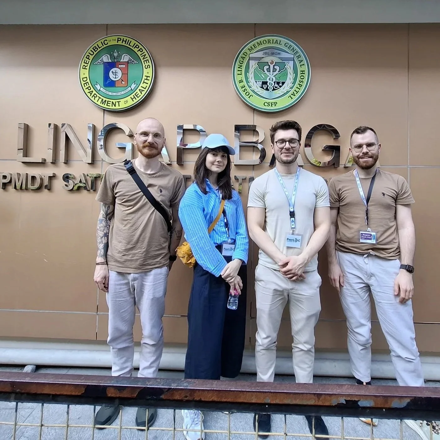   The Polish team outside the Lingap Baga clinic: (L-R) Mateusz Bruss. Julia Jaszak, Jakub Wyrwińsk, Bogusz Aksak-Wąs    