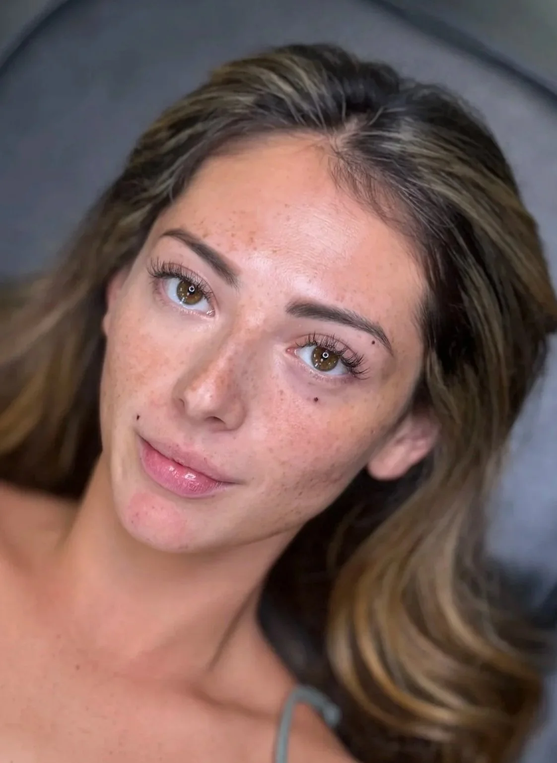 Cosmetic beauty mark tattoo on the cheek by Adia Tattoo in San Diego