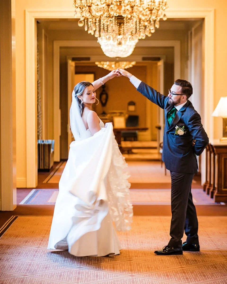 In the soft glow of natural light, the warmth from the window wraps gently around the couple, creating an intimate and romantic feel.

Simple poses like taking your partner for a spin, leaning in close, resting foreheads together, or holding hands le