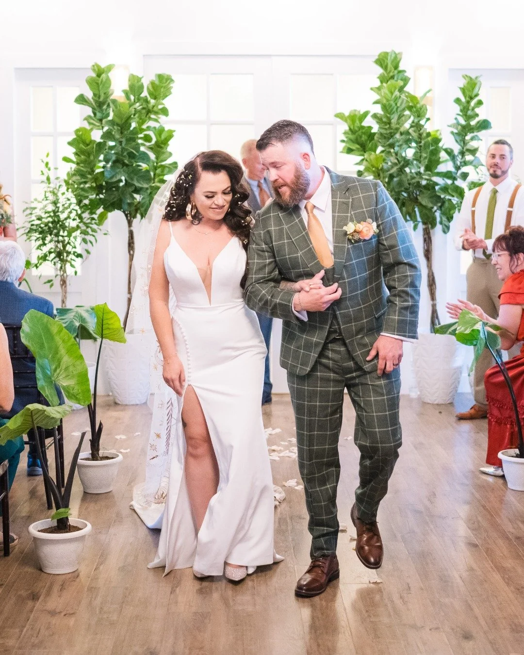 Strutting down the aisle and dancing into the reception. Nothing shows off that just-married glow quite like this. A little style, a little sass, and a whole lot of love made the perfect ending to a day full of joy and new memories.

Couple: Rob &amp