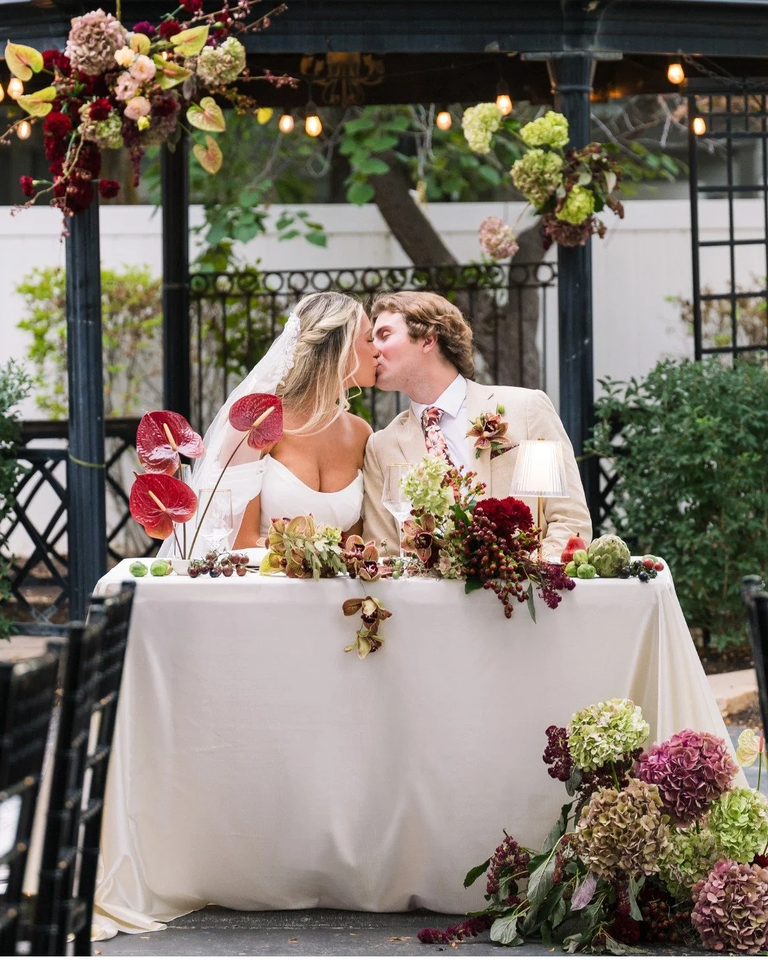 Soft light, late-summer air, and two people completely wrapped up in each other. 

Presley and Bjorn celebrated with toasts, cake, and so much laughter, surrounded by lush florals, soft fabrics, and warm tabletop details that tied everything together
