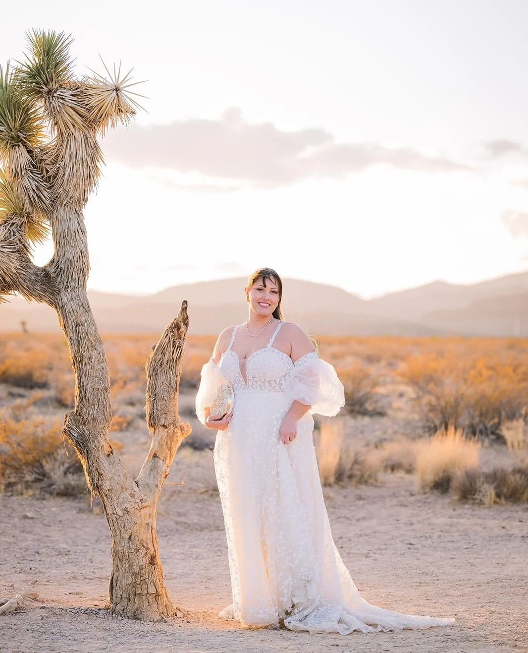The desert has a way of reminding you that beauty doesn't have to shout.⁠
⁠
It exists in the quiet. In the golden light stretching across the landscape. In the wind catching a veil. In two people choosing each other beneath an endless sky.⁠
⁠
The mos