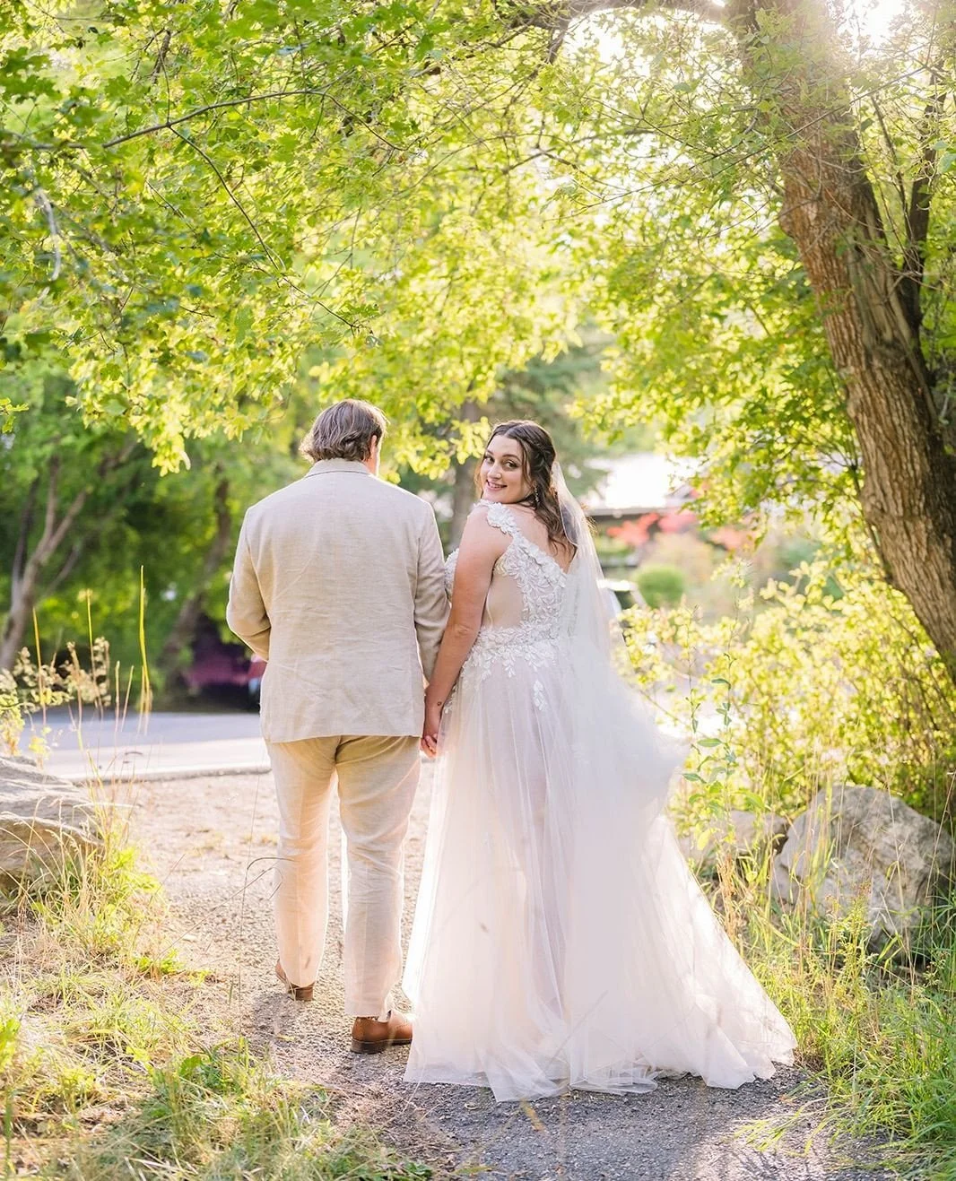 A quiet walk away from the celebration, and a few minutes that were entirely theirs.⁠
⁠
#WeddingPhotography #JustMarried #WeddingPortraits #WeddingDay #UtahWeddingPhotographer