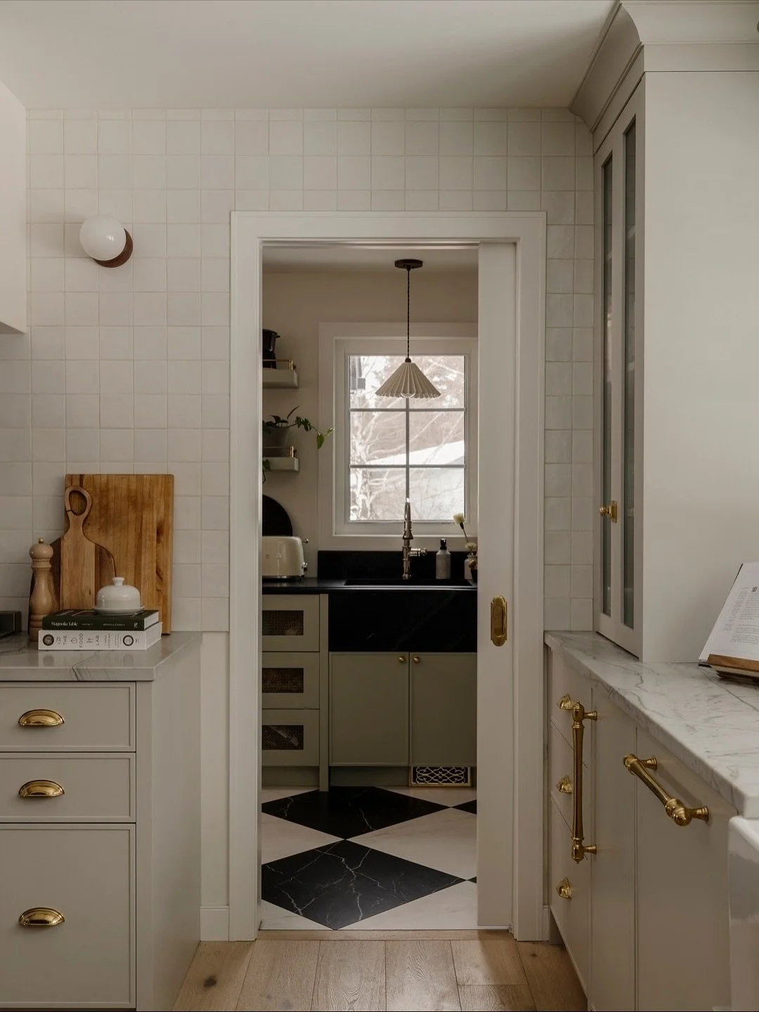 Pantry. The walk in pantry at #AVDVarsity is not only super functional but oh so pretty. Sliding mesh doors create air flow, an apron front sink is a stunner, drawers for more storage and that checker board tiled floor gives us all the ooh la la&rsqu