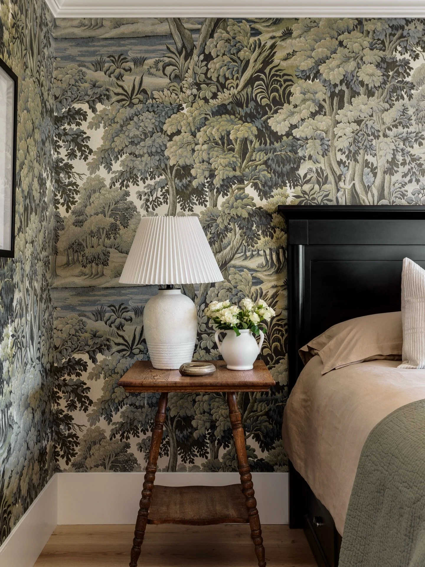 Antiques. We&rsquo;ve always loved the art of mixing old and new. Our curated collection of antiques adds soul, history, and character to the spaces we design&mdash;like this stunning side table that found its perfect home in the primary bedroom at #