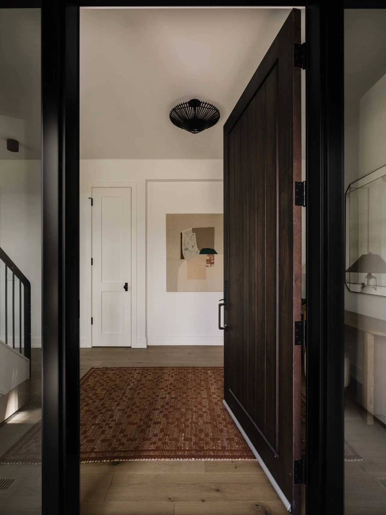 Entry. The first impression sets the tone for the entire home. At #AVDParkHill, the staircase is the architectural focal point, so the entry was designed to intentionally lead the eye toward this feature. A layered, curated approach creates a warm an