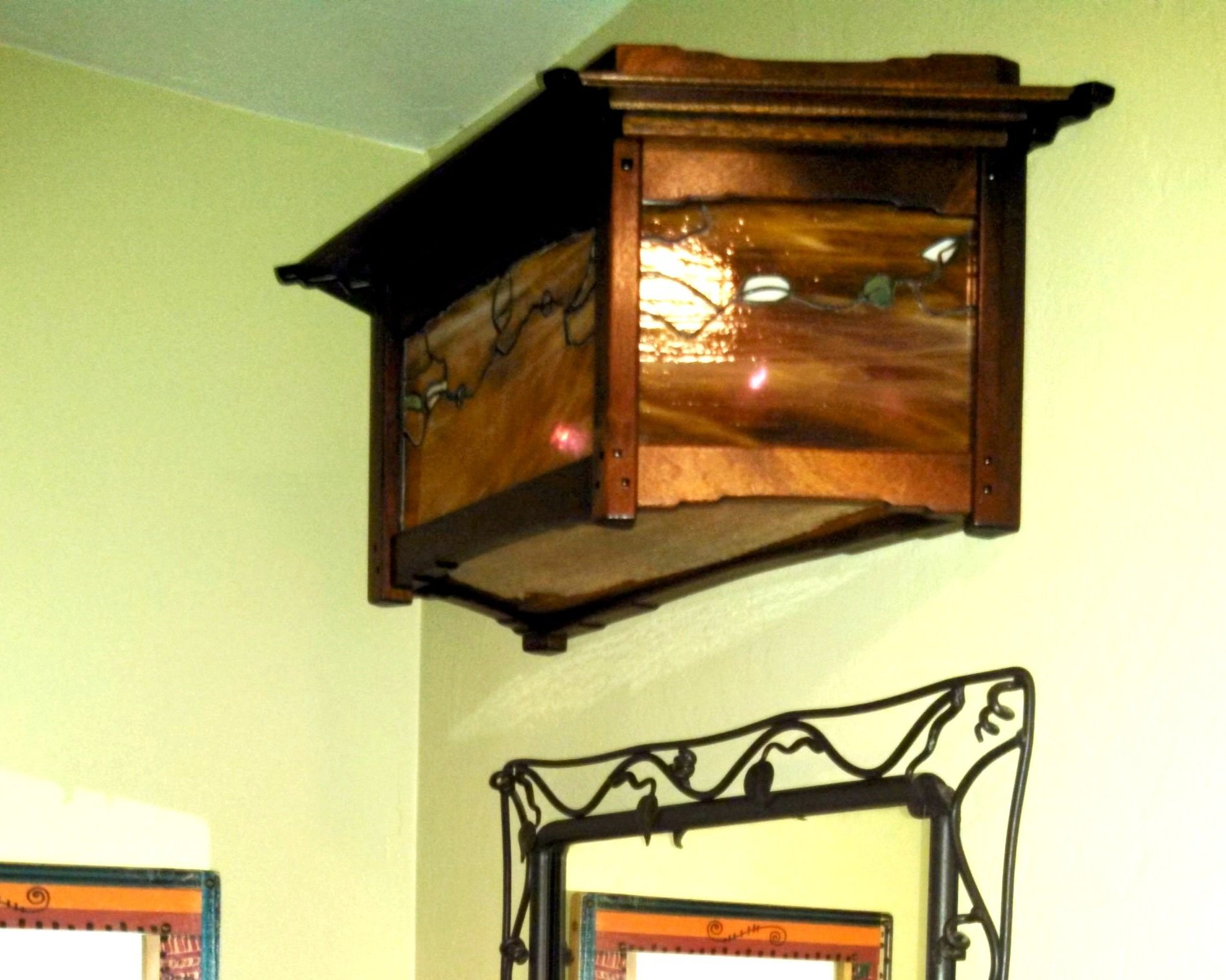 This is an image of the wall sconces in a bathroom.