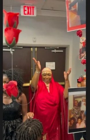 Guest of honor joyfully reacting to a 75th surprise birthday celebration designed and planned by Moments Planning