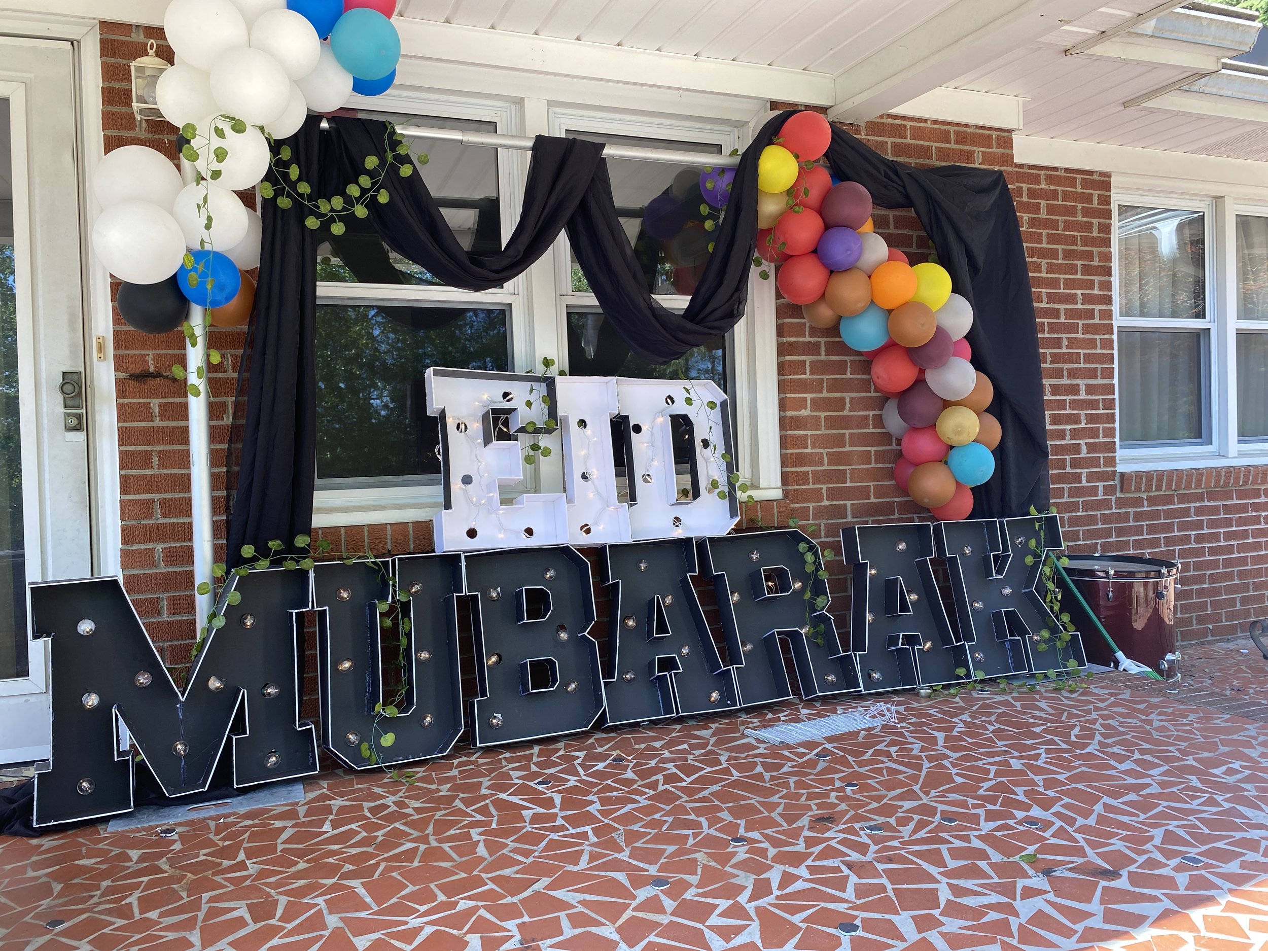 Vibrant Eid Mubarak balloon installation blending faith, family, and festivity — a joyful design that celebrates community and color.
