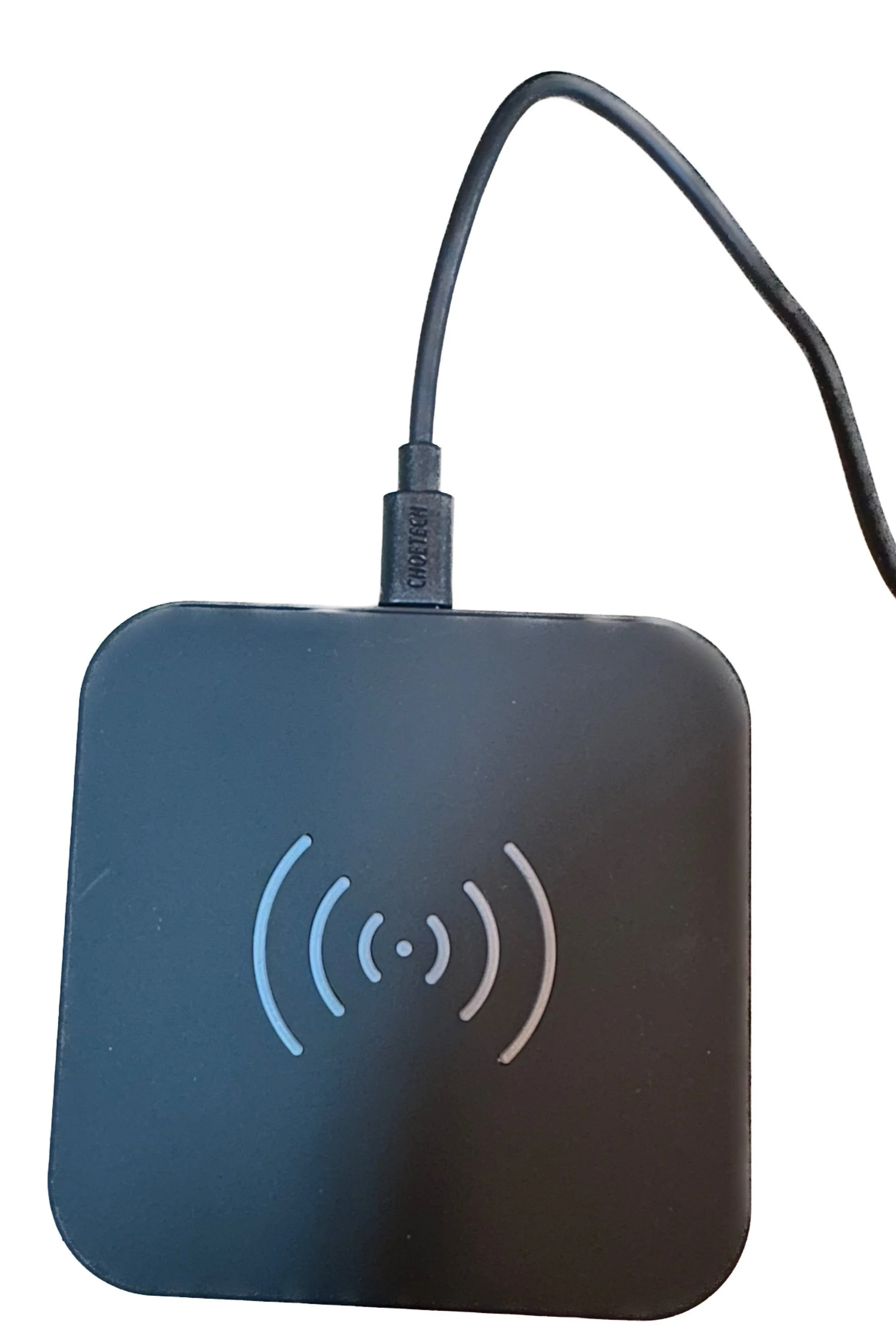 Charging cord plugged in to charging pad