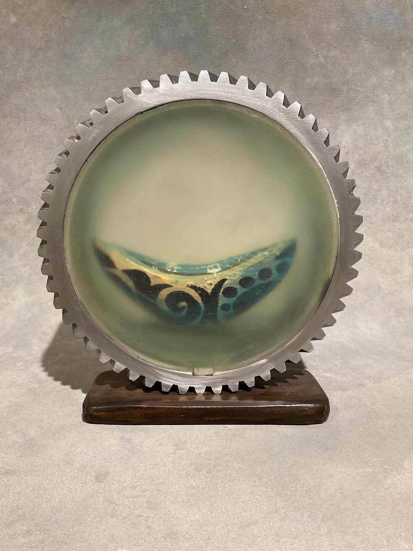 Steve Jensen 
 Blue Boat in the Portal  
12x11x3.5 
oil on carved wood boat resin salvaged ship steel part 
$650