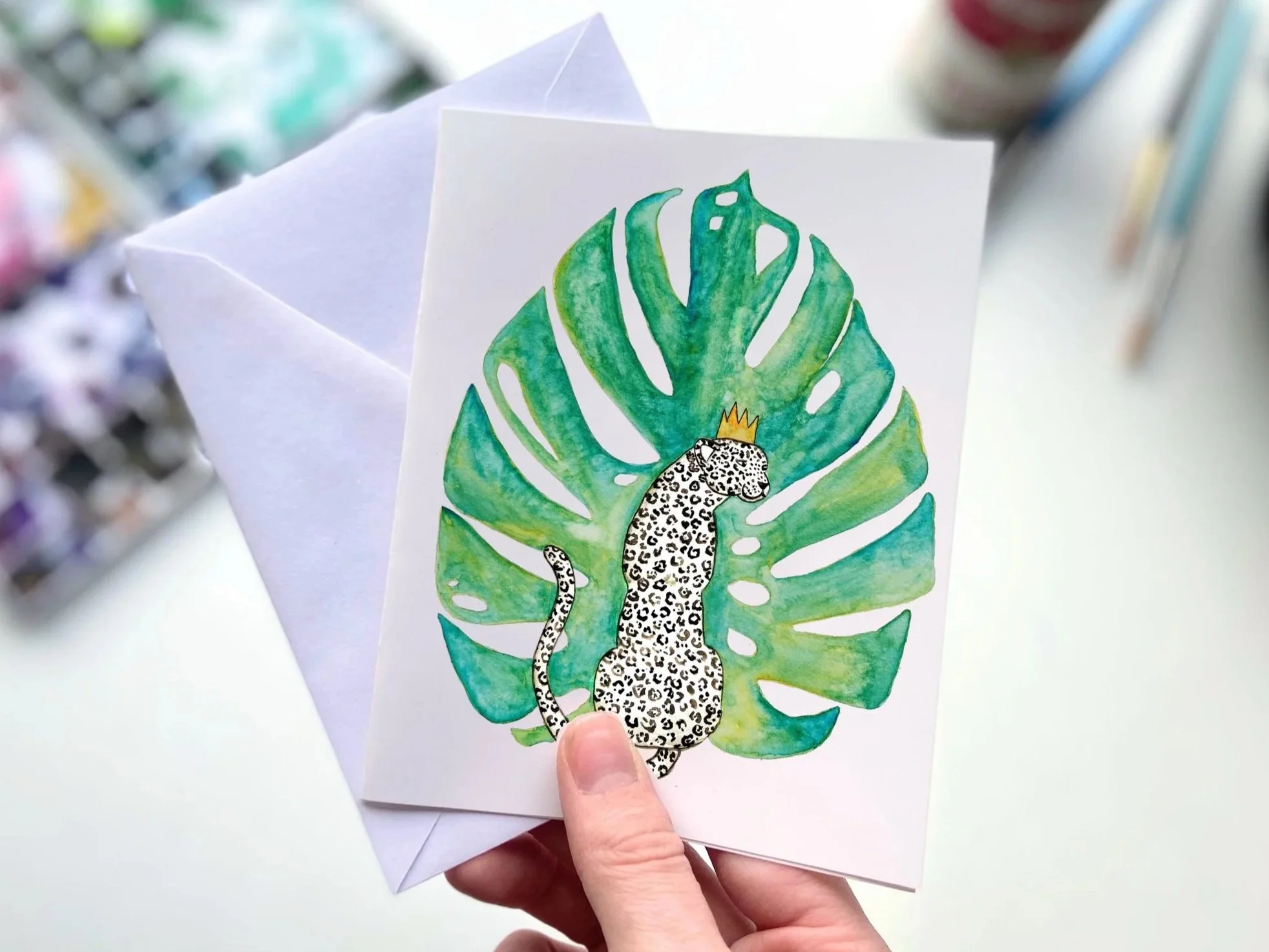 Monstera Leaf Jaguar Watercolor Greeting Card – Jungle Animal & Tropical Plant Stationery