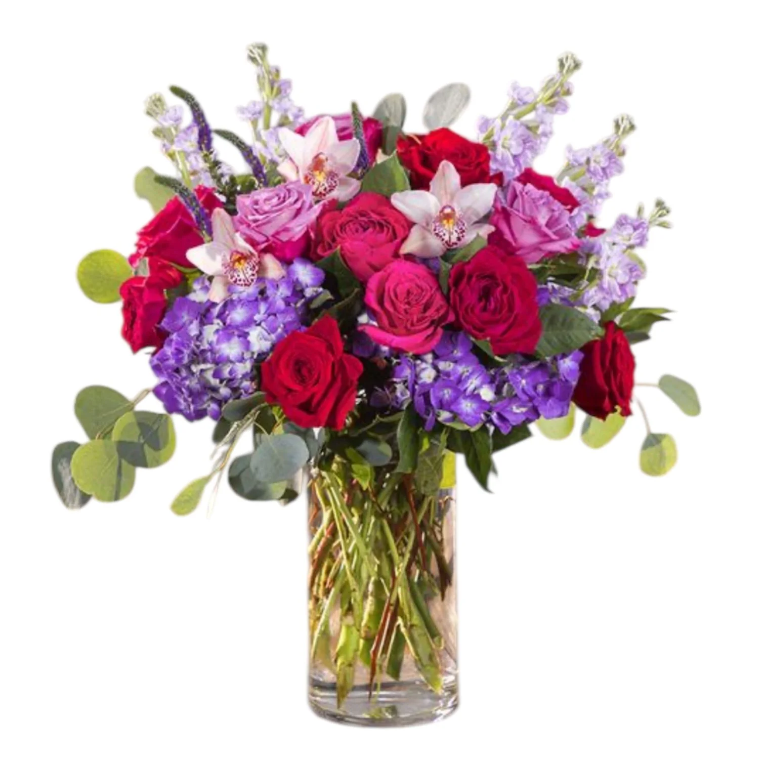 A bouquet of pink, purple, and red flowers in a clear glass vase