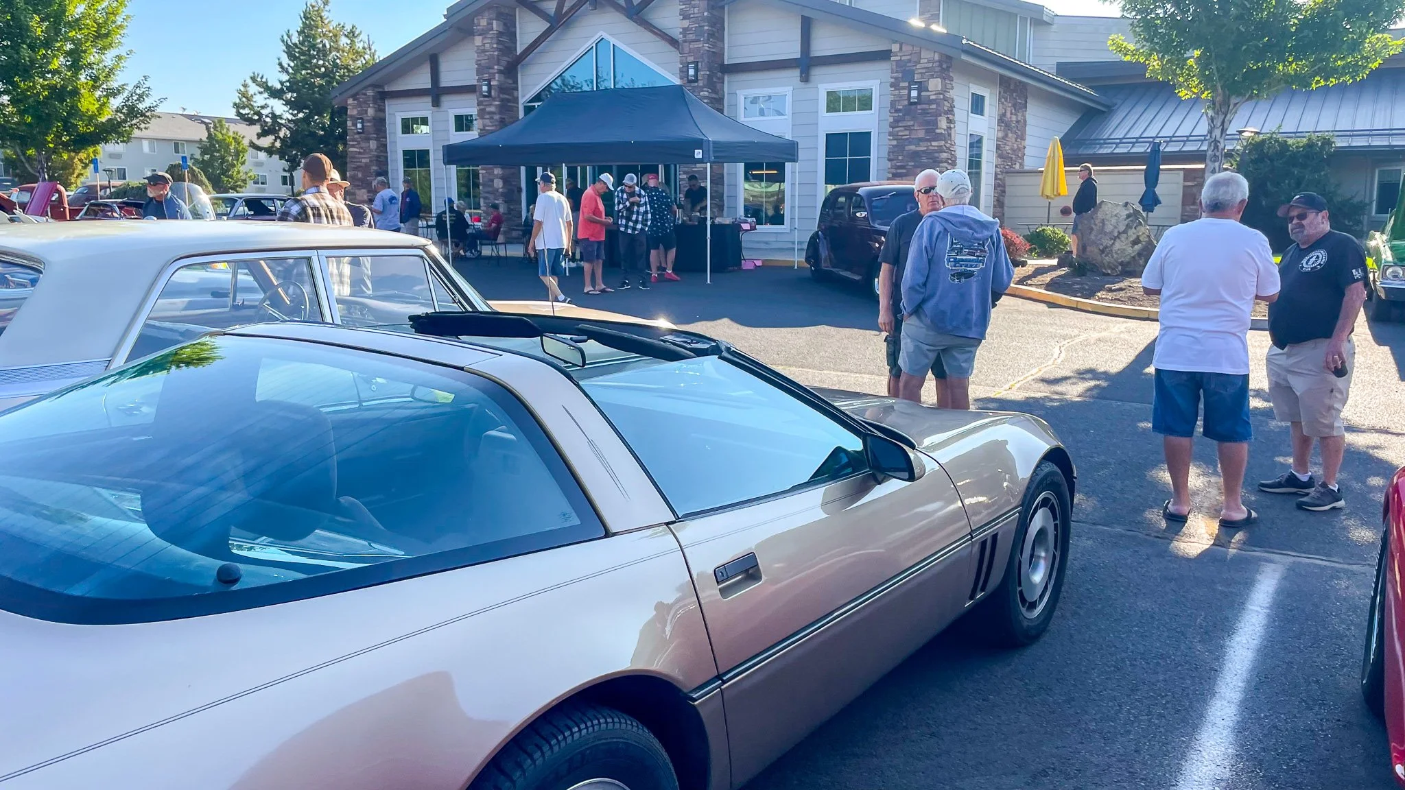 1990s Corvette and coffee booth at bend cars and coffee.jpg