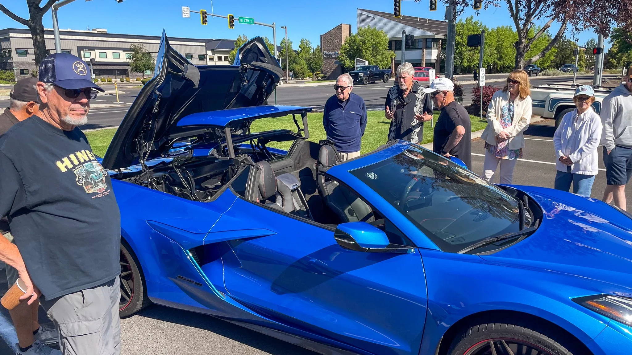 crowd around corvette supercar at Bend Cars & Coffee on 27th St first Saturdays.jpg